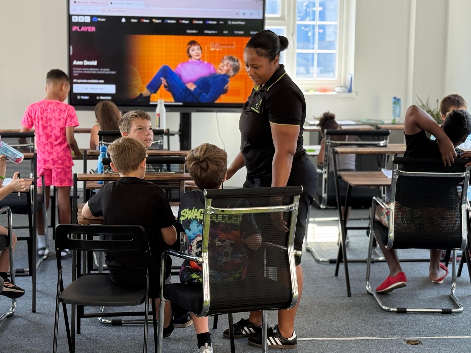 Young people learning in an Eden House classroom